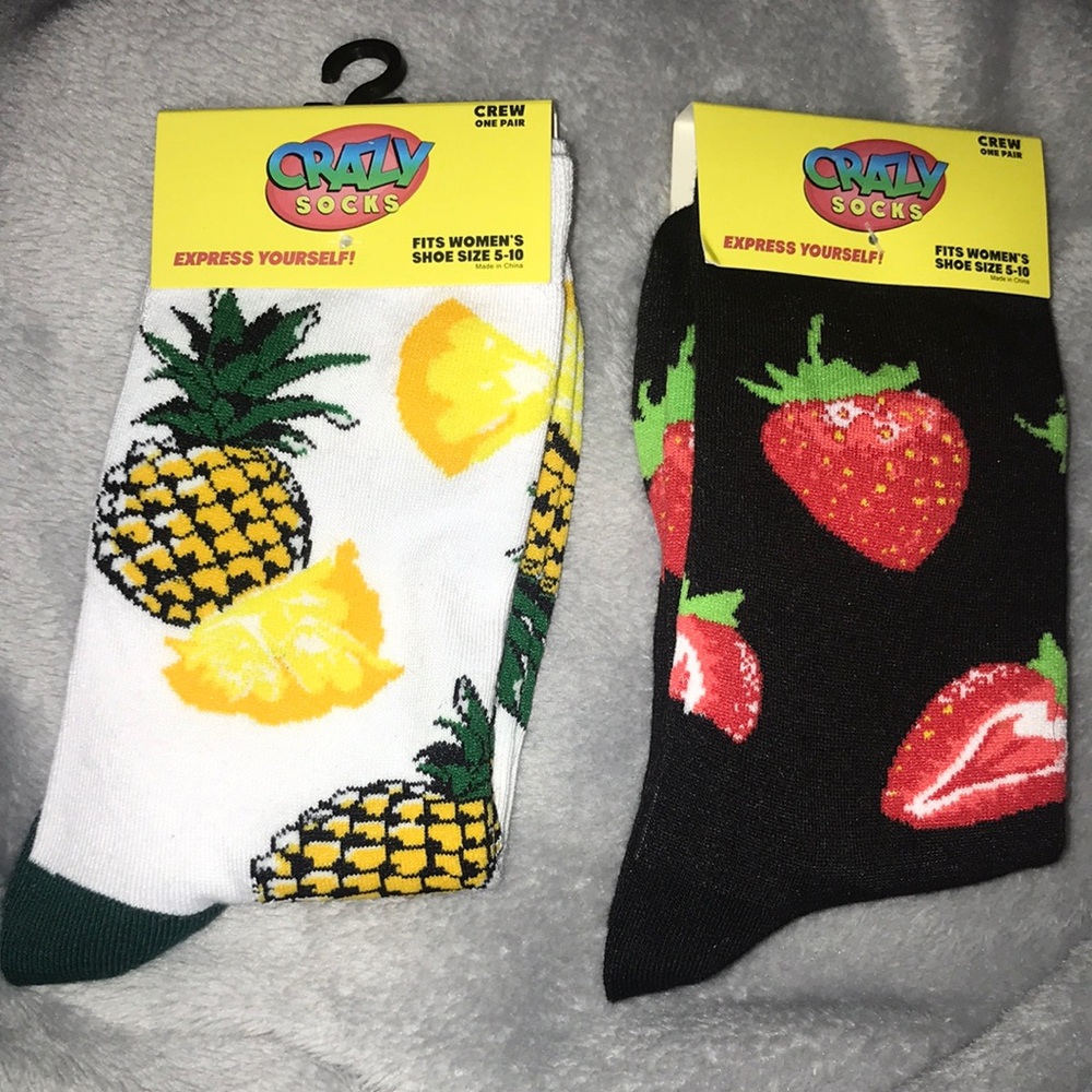 Both pineapple and strawberry socks
